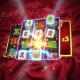 A vibrant, high-definition interface of a Mahjong-themed online slot game, showcasing the cascading reels feature with glowing golden Mahjong tiles and a high win multiplier.